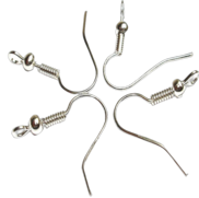 <notranslate>a set of silver earrings</notranslate>