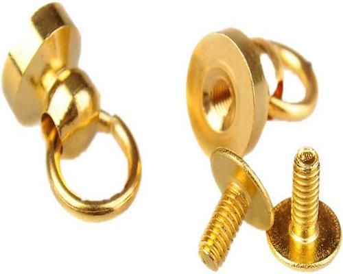 un Lot De Rivets Dorés En Laiton