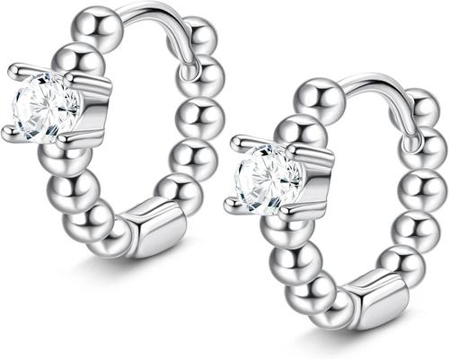 une Paire De Créoles Huggie Géométriques