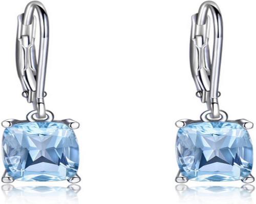 une Paire De Boucles D'Oreilles Topaze Bleue