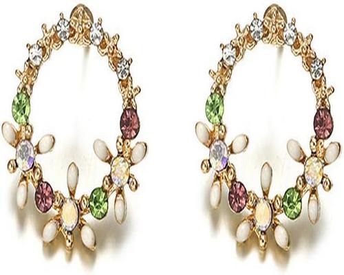 une Paire De Boucles D'Oreilles Carry Stone