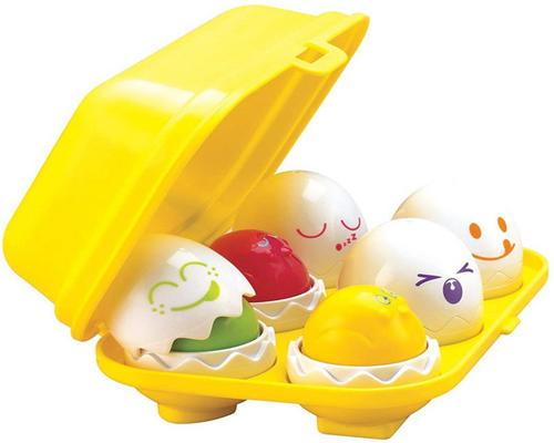 a Tomy- Toomies Piou Surprise Toy E1581 Shape And Color Sorter