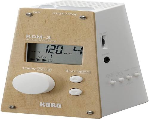 Um afinador digital em formato de pirâmide Korg Kdm3 com seleção de sons e ritmos integrados