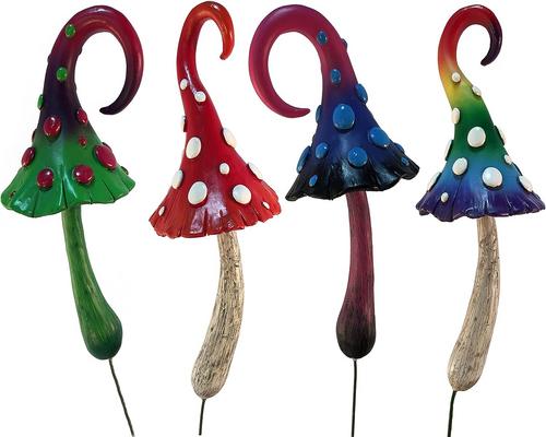 Un set di figure sfarzose di 4 funghi magici in miniatura incantati