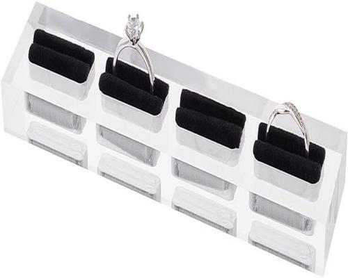 un accesorio Fingerinspire Soporte acrílico de 4 ranuras con terciopelo negro